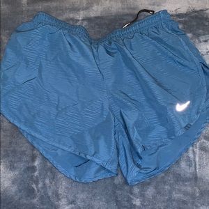 Blue Nike Dri-Fit workout shorts